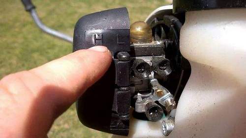 How to Adjust a Carburetor on a Stihl 38 Lawnmower