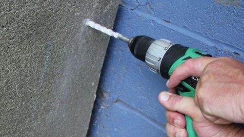 is it possible to drill a wall with a drill